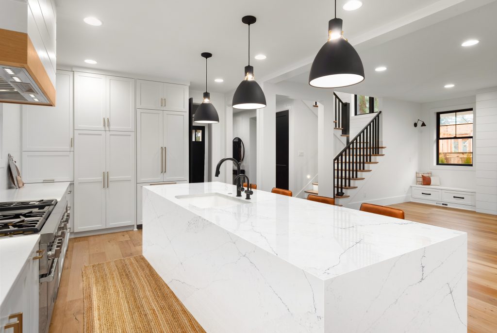 Beautiful,White,Kitchen,With,Dark,Accents,In,New,Modern,Farmhouse